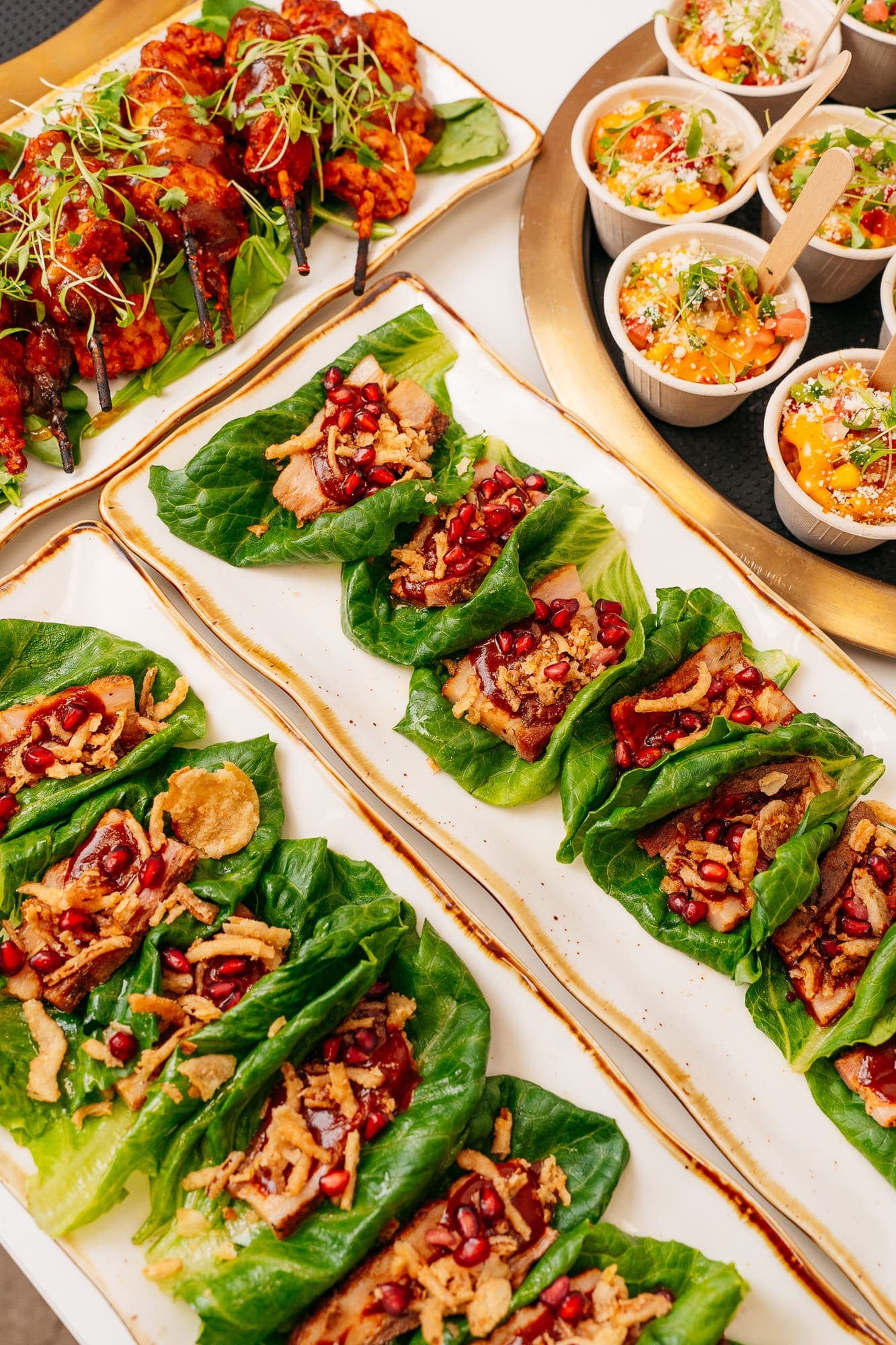 Pork belly lettuce wraps with pomegranate and crispy shallot